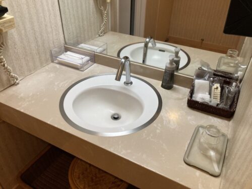和多屋別荘の客室（【タワー棟】青森ヒバ使用・内風呂付き客室(禁煙)）の洗面所